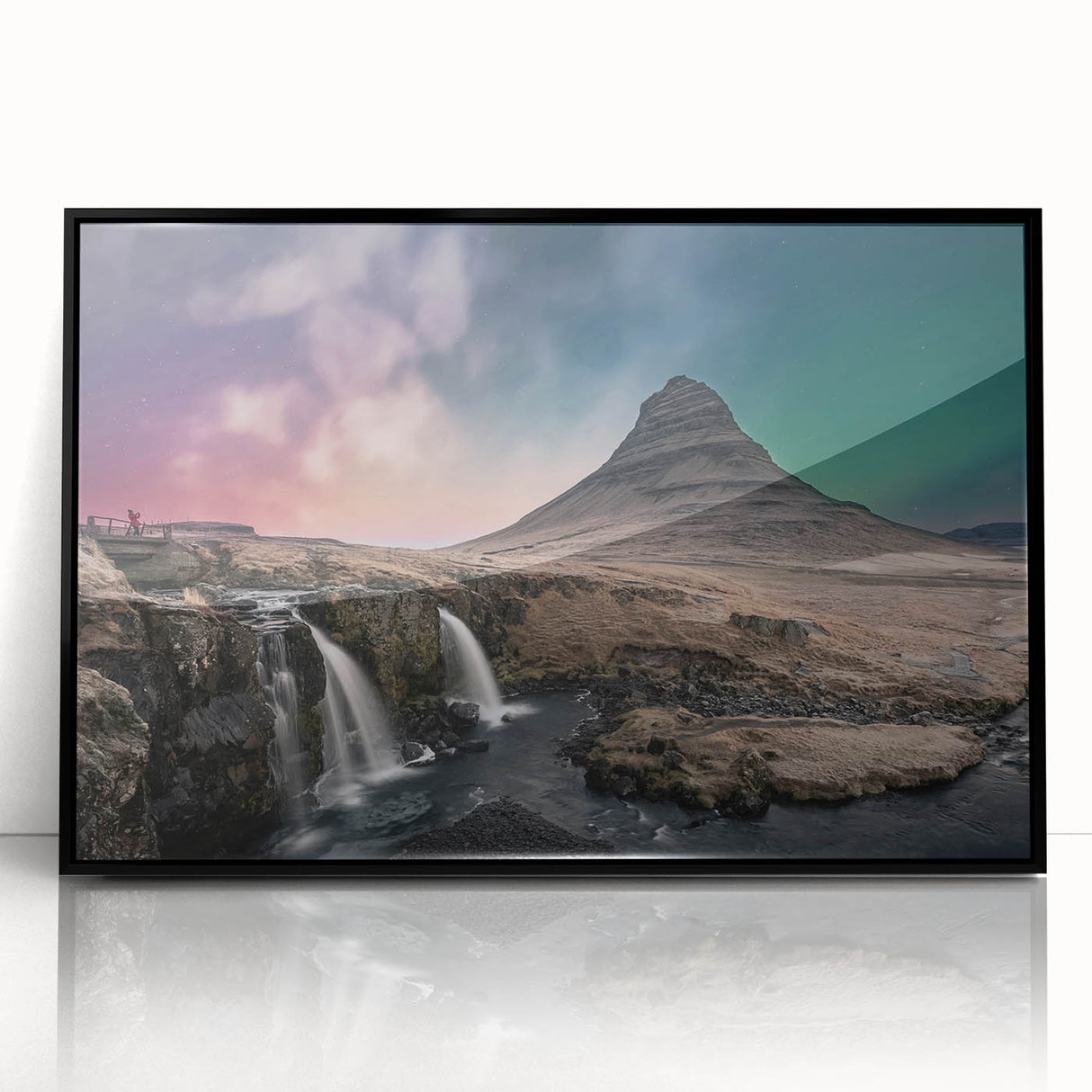 Large abstract wall art featuring a scenic Icelandic landscape in muted gray and blue tones, framed in black acrylic.