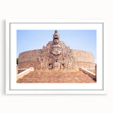 Abstract art print of Yucatan scenery in muted earth tones on a white-framed canvas.