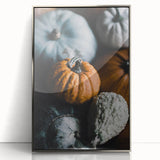Mid-century modernist art featuring an abstract fall scene in warm orange tones on a framed acrylic print.