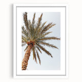 Abstract art print featuring swirling blue and white patterns on a framed canvas.