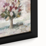 Close-up of an abstract floral framed canvas artwork showcasing vibrant colors like pink, blue, and green, perfect for enhancing modern home decor aesthetics.