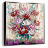 Framed canvas artwork showcasing an abstract floral design in vibrant colors, displayed against a sleek black background, perfect for modern home decor.