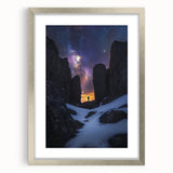 Framed landscape artwork depicting dramatic cliffs, featuring a sleek silver frame and matting, perfect for modern home decor or gallery display.