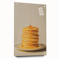 Large abstract wall art of assorted pastries in vibrant colors on acrylic glass, ideal for dining room decor.