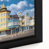 Extra large framed canvas of a textured African scenery in black with vibrant colorful accents, ideal for living room decor.