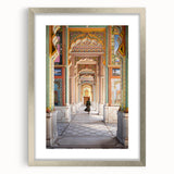 Textured abstract art print of an Indian landscape in muted earth tones on a framed canvas, suitable for bedroom decor.