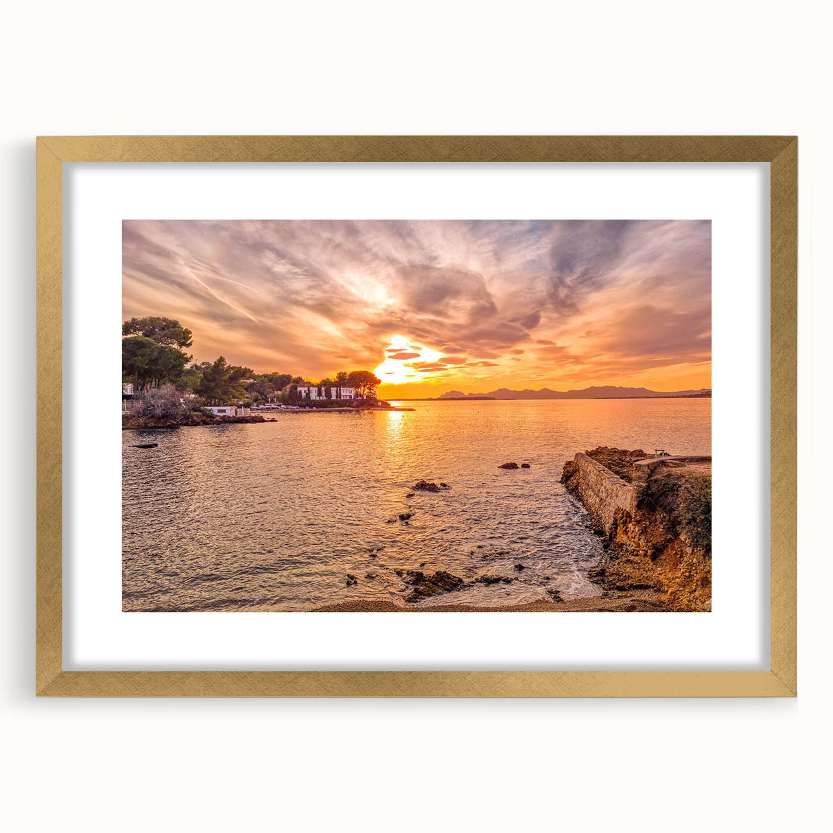 Abstract art print depicting a serene French landscape in soft pastel shades, framed in gold, ideal for dining room decor.