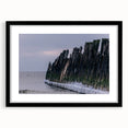 Abstract art print of a European scene in vibrant colors on a textured, extra large canvas, framed in black.