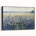 Framed canvas artwork showcasing a vibrant abstract floral design in bold colors, with a sleek black frame, perfect for modern home decor.