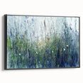 Framed canvas artwork showcasing an abstract floral design in vibrant colors, presented from a side view against a black background, ideal for modern decor.