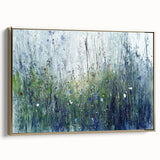 Framed canvas artwork showcasing an abstract floral design with vibrant colors, featuring a luxurious gold frame, perfect for modern home decor.