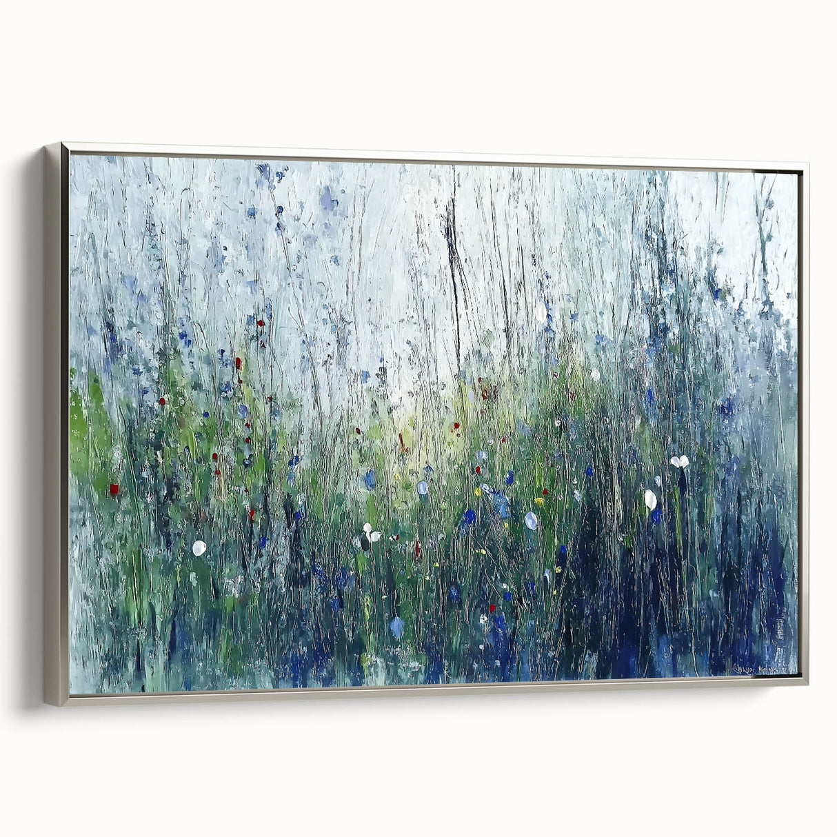 Framed canvas print showcasing abstract floral designs in vibrant colors, elegantly set against a sleek silver frame, ideal for contemporary home decor.