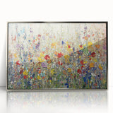 Framed acrylic artwork showcasing an abstract floral design in vibrant colors, displayed in a sleek silver frame, perfect for modern home decor.