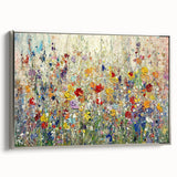 Framed canvas artwork showcasing abstract floral designs in vibrant colors, presented in a sleek silver frame, ideal for modern home decor.