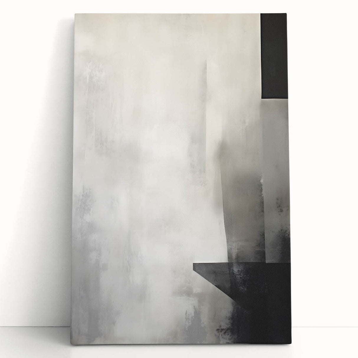 Abstract minimalist wall art on stretched canvas, showcasing soft earth tones of beige and taupe, leaning against a neutral wall, ideal for modern decor.