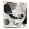 Abstract geometric acrylic art piece displayed from a side view, featuring vibrant colors and intricate designs, secured with transparent pins for a modern aesthetic.
