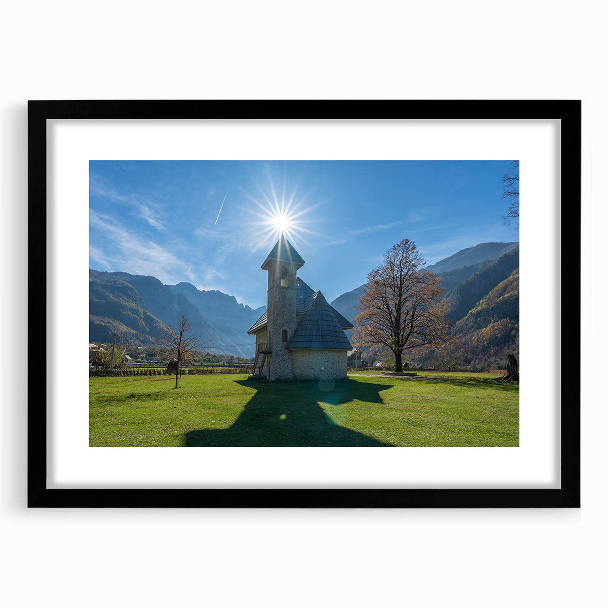 Extra large abstract art print of a colorful, textured European scenery on a black framed canvas.