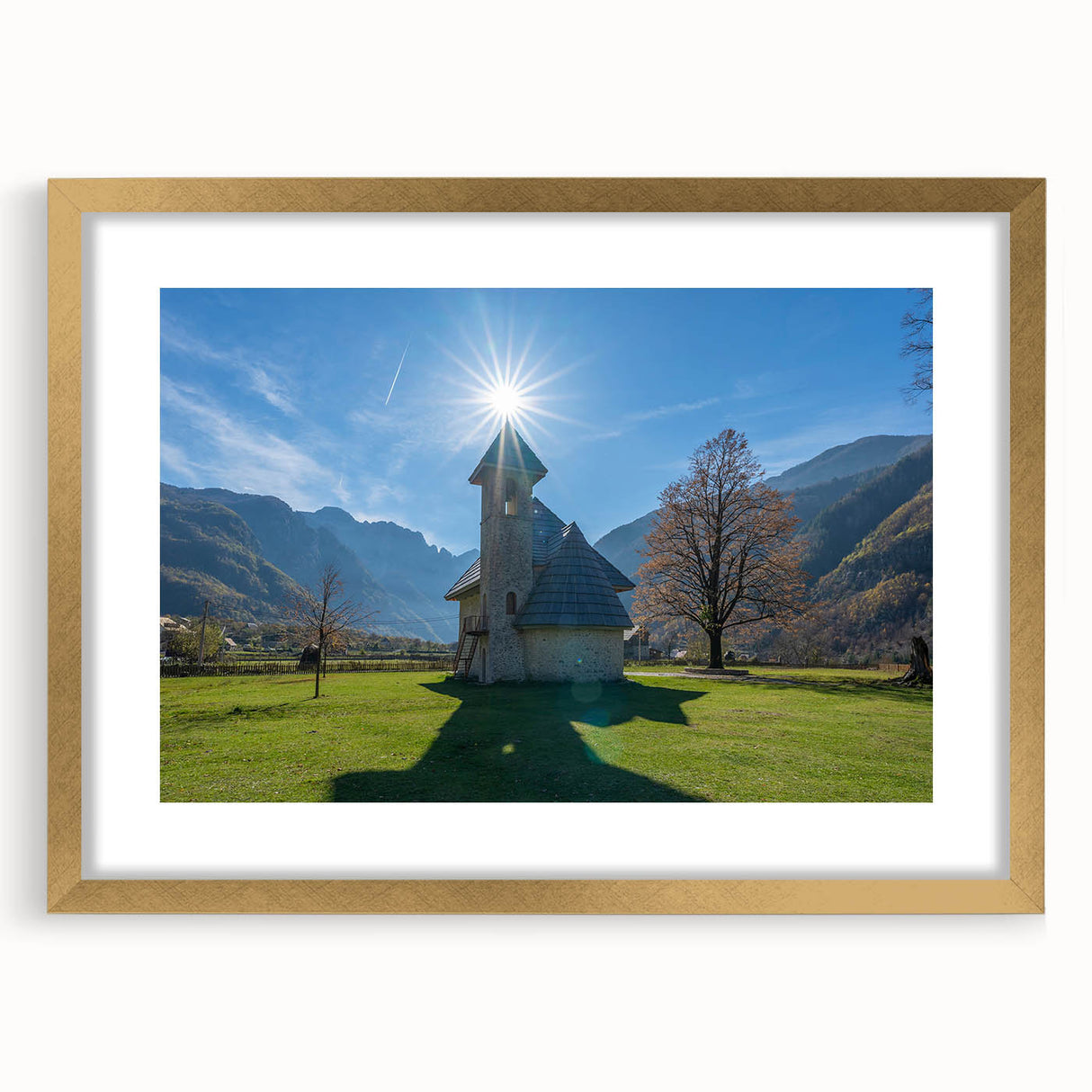 Textured abstract art print depicting a European scenery in muted earth tones, framed in gold, ideal for bedroom art.