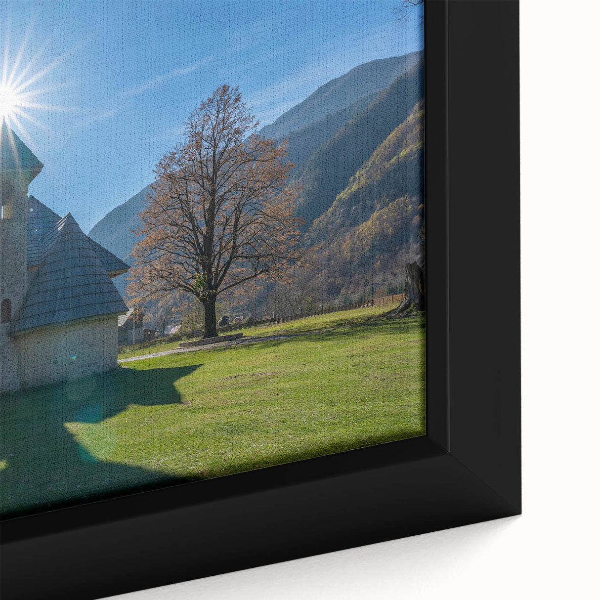 Textured black wall art depicting a scenic Albanian landscape on a framed canvas, with vivid colors.