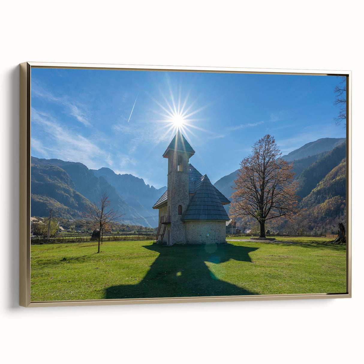Vintage poster art of Albanian scenery on framed canvas, featuring colorful art in gold and black.