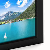 Extra large framed canvas featuring a textured depiction of a European scenery in black with vibrant, colorful accents.