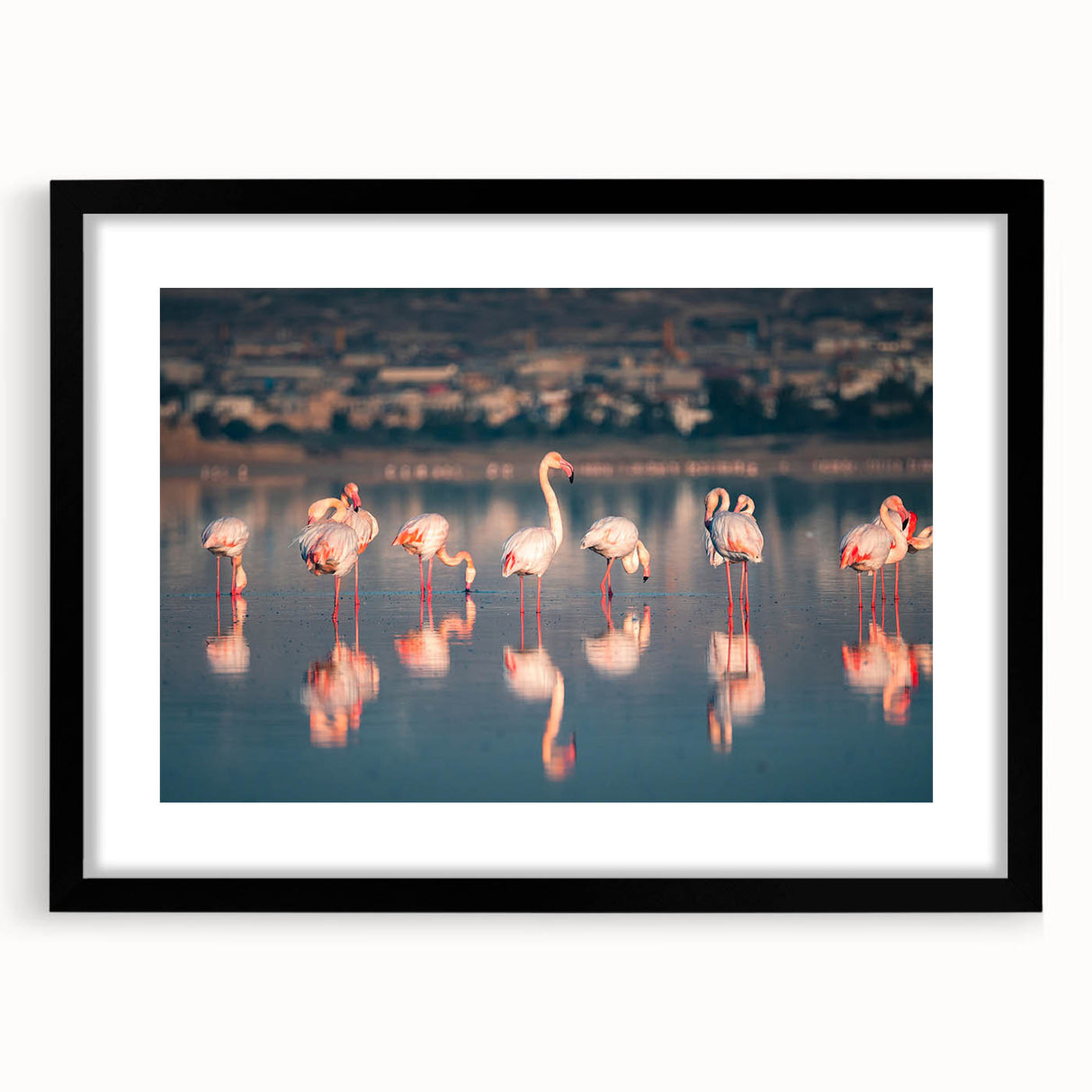 Extra large abstract art print of a colorful European scenery on textured canvas, framed in black.