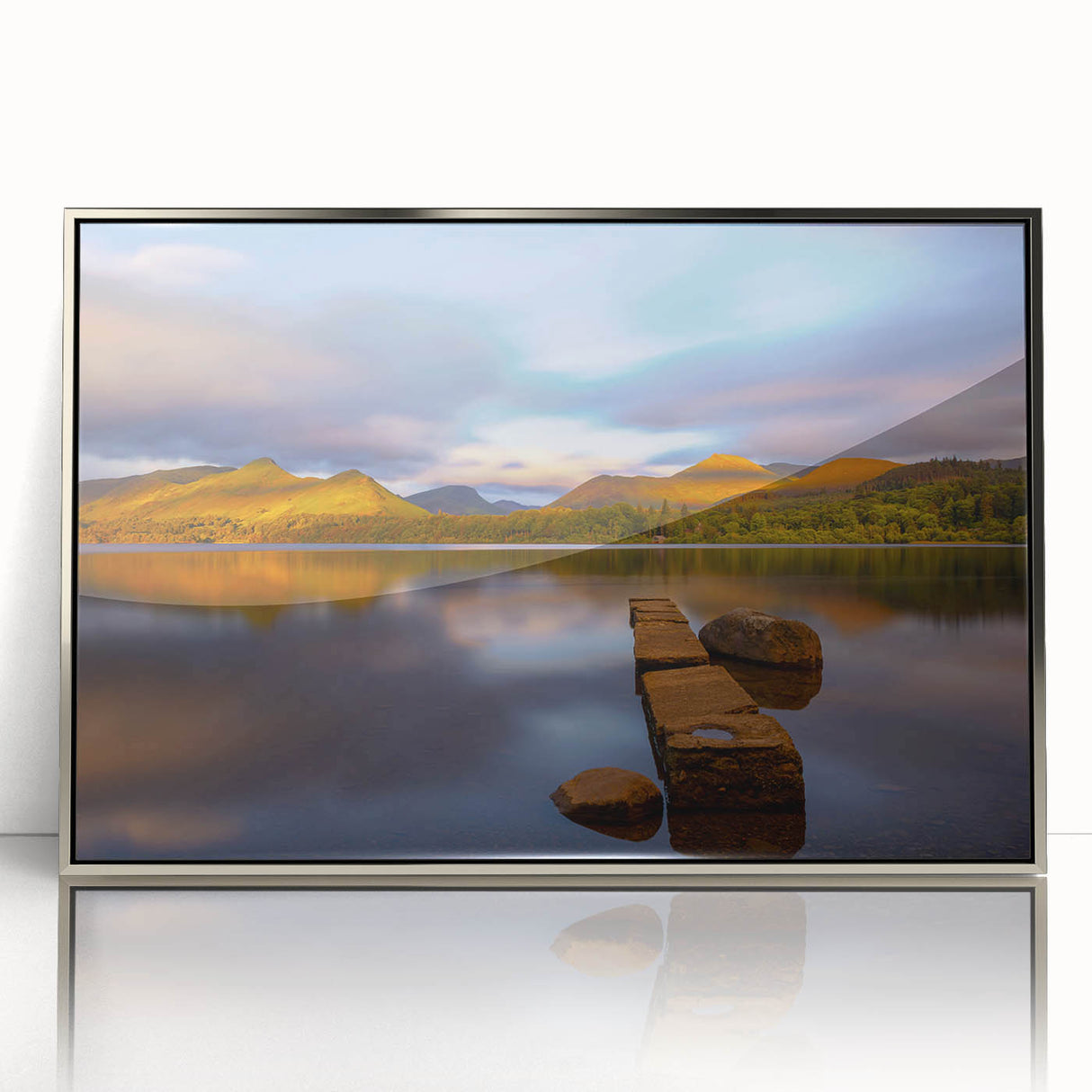 Acrylic print of a Cumbrian landscape in England, featuring muted earth tones, framed in silver.