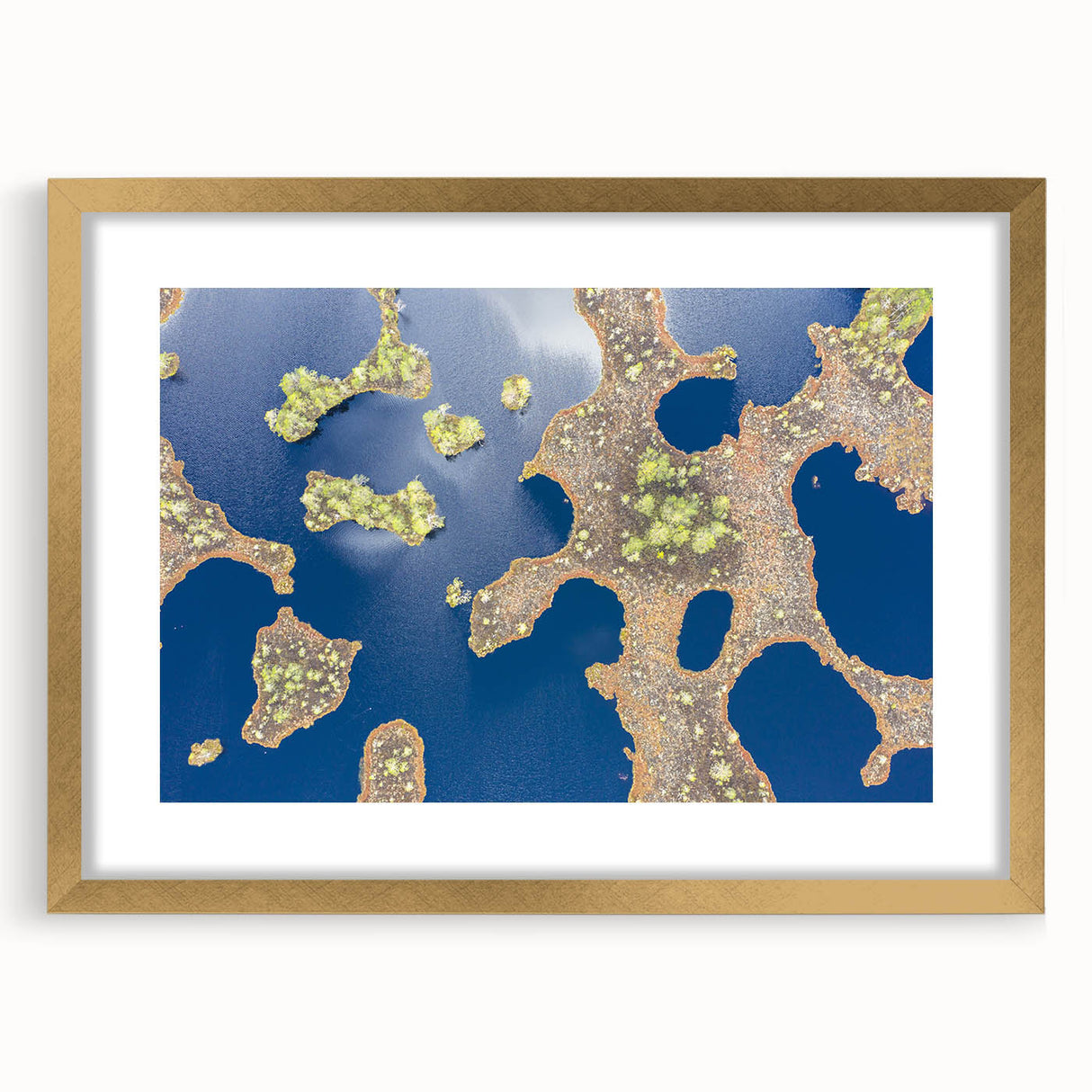 Abstract art print of a European scenery in muted earth tones on a framed canvas, suitable for dining room decor.
