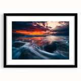 Extra large abstract art print featuring a colorful, textured depiction of a European scenery on a black framed canvas.