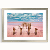 Textured abstract art print depicting Yucatan scenery in muted earth tones, framed in silver, suitable for bedroom decor.