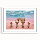Abstract art print of Yucatan scenery in muted green and blue tones on a white framed canvas.