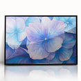 Framed acrylic artwork showcasing vibrant abstract floral designs in shades of blue, pink, and gold, set against a sleek black background, perfect for modern decor.