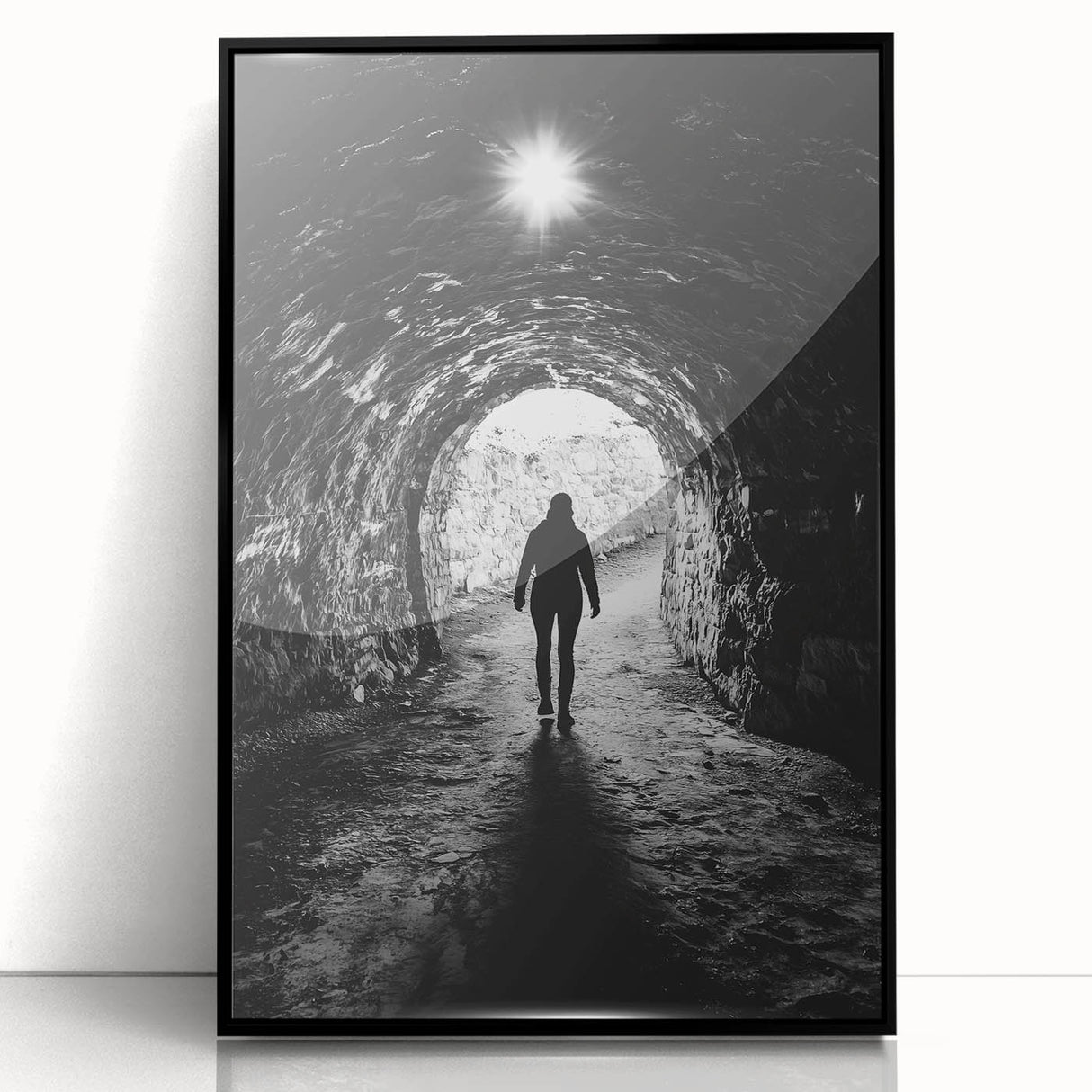 Framed acrylic artwork depicting a stunning cave landscape with rich textures and vibrant colors, set in a sleek black frame for modern decor. Perfect for nature lovers.