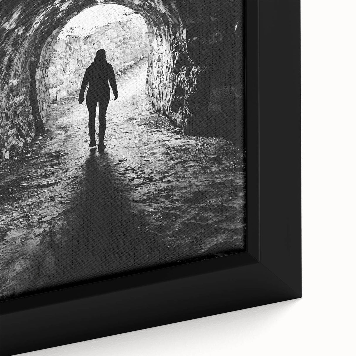Close-up of a framed canvas artwork depicting a vibrant landscape with caves, showcasing intricate details and earthy tones, perfect for home decor enhancement.
