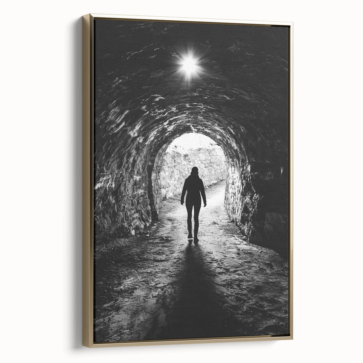 Framed canvas artwork depicting a serene landscape with caves, featuring a gold frame that enhances the visual appeal, perfect for modern home decor.