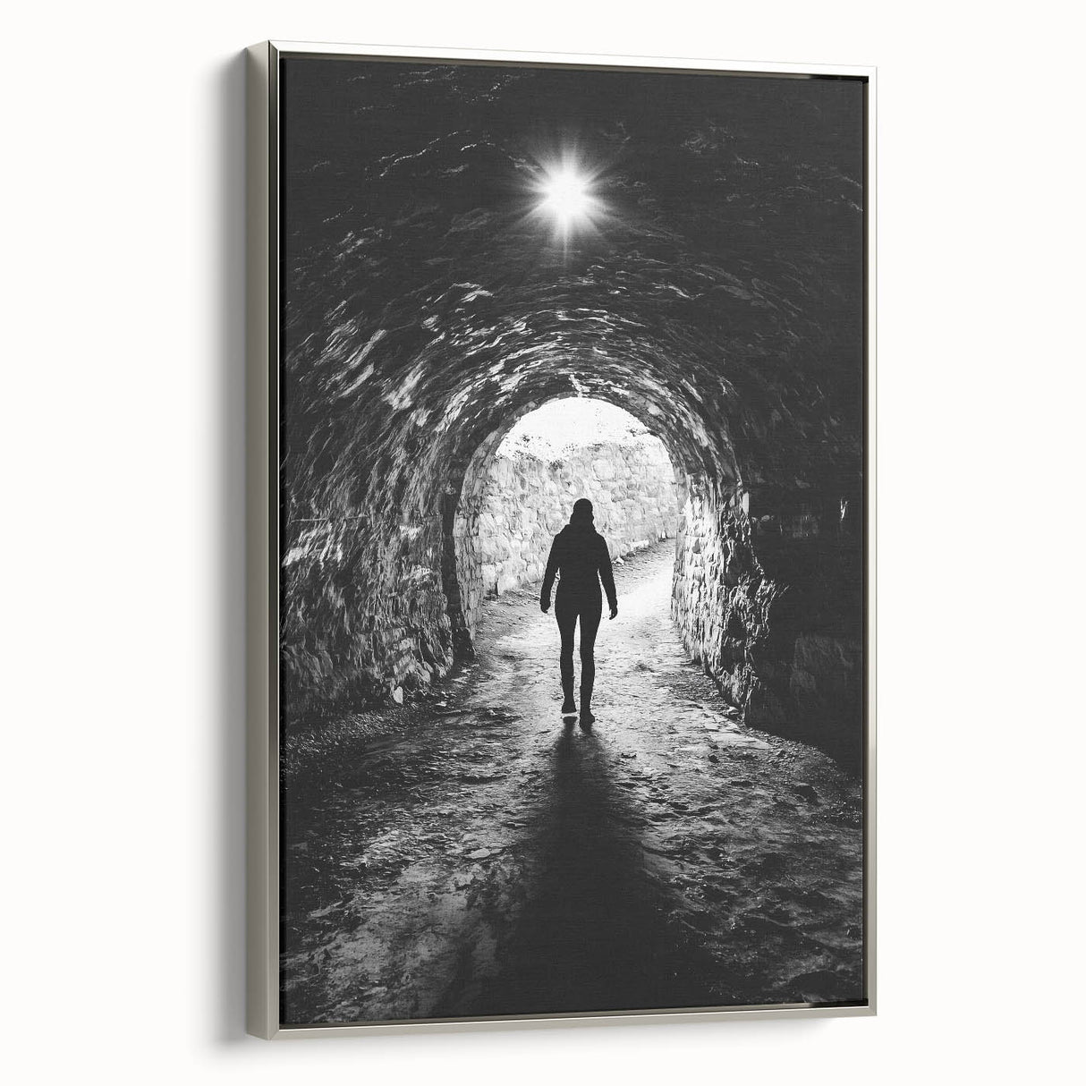 Framed canvas artwork showcasing serene landscapes with caves, highlighted by a silver frame. Perfect for enhancing modern home decor and creating a tranquil ambiance.