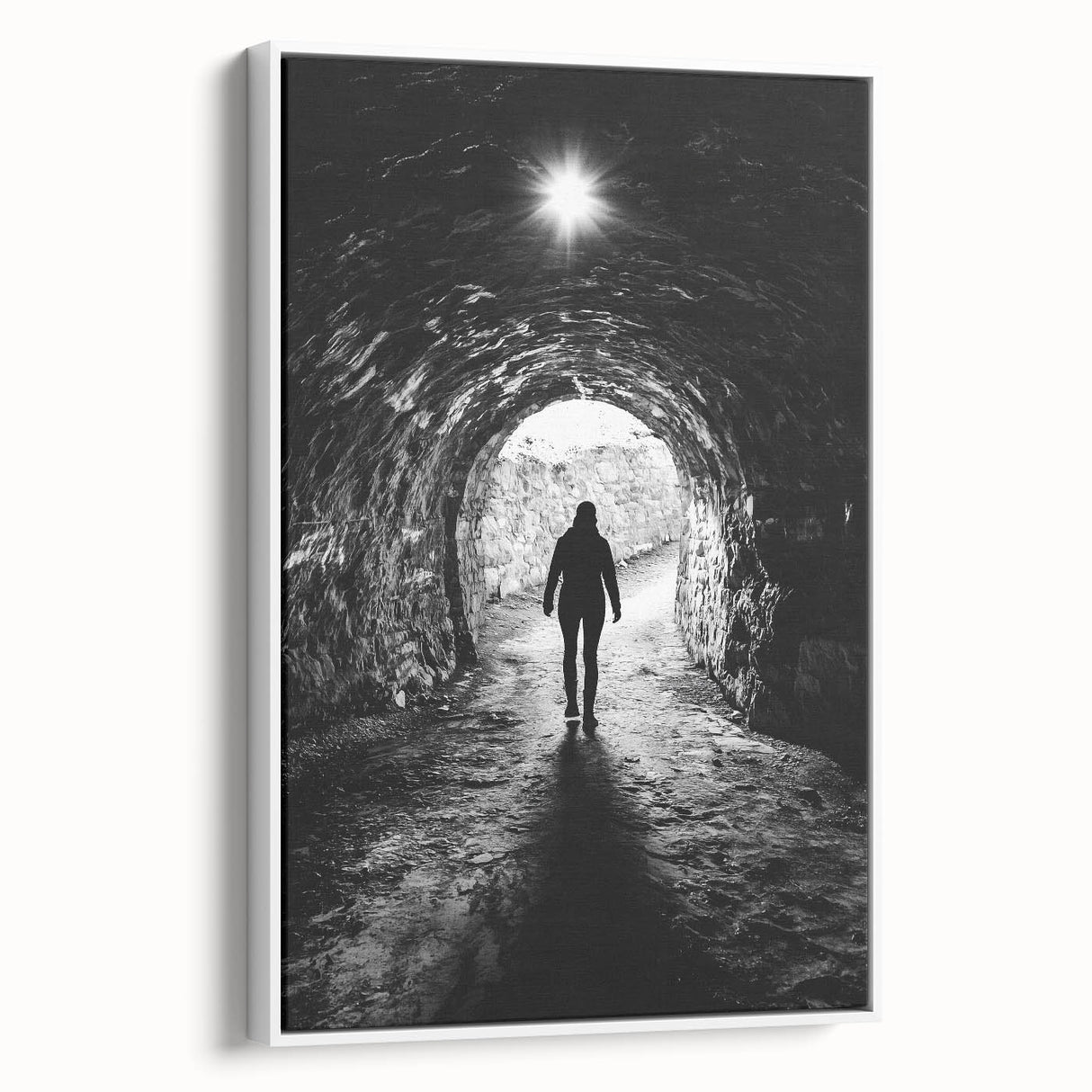 Framed canvas artwork depicting a serene landscape with caves, featuring natural earthy tones and textures, ideal for enhancing home decor and ambiance.