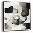 Framed geometric abstract canvas artwork in black, showcasing intricate patterns and sharp angles, perfect for modern home decor or office settings.