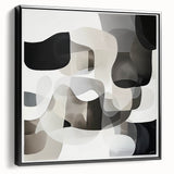 Framed geometric abstract canvas artwork in black, showcasing intricate patterns and sharp angles, perfect for modern home decor or office settings.
