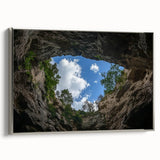 Framed landscape canvas depicting a stunning canyon scene with vibrant colors and detailed textures, featuring a sleek silver frame to enhance decor.