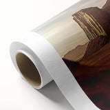 Desert landscape rolled canvas art showcasing vibrant hues of orange and yellow against a dramatic blue sky, elegantly packaged in a protective tube for safe transport.