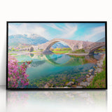 Large abstract wall art depicting a European Albanian scenery in vibrant earth tones on a black framed acrylic.