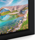 Extra large framed canvas featuring a textured depiction of an Albanian landscape in black with vibrant, colorful accents.
