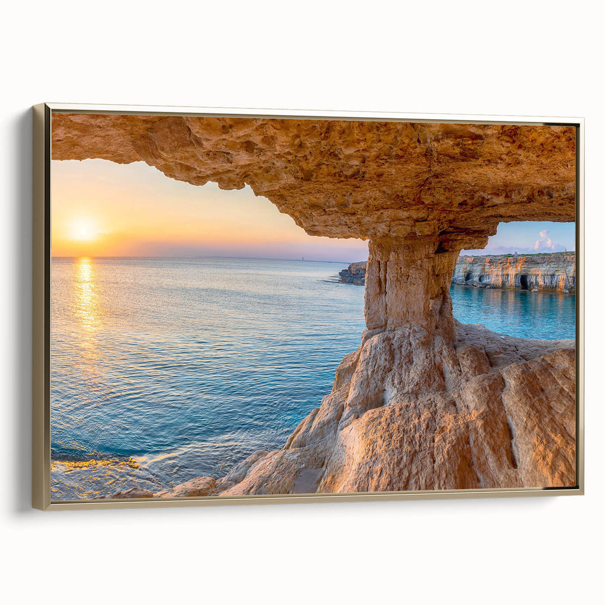 Framed canvas wall art depicting a vintage-style landscape of Cyprus with muted gold and black tones.