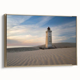 Framed canvas featuring a vintage-style landscape painting of a European scene in muted gold and black tones.
