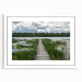 Textured abstract art print of a European scenery in muted earth tones on a framed white mat, ideal for bedroom art.