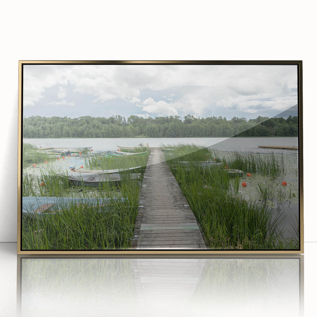 Art deco poster depicting a serene European landscape in muted gold and blue tones, acrylic framed.