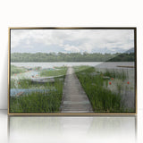 Art deco poster depicting a serene European landscape in muted gold and blue tones, acrylic framed.