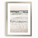 Textured abstract art print in muted earth tones, framed in silver, ideal for modern bedroom ambiance.