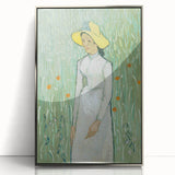 Large art print of Van Gogh's Starry Night in a silver frame, featuring vibrant blues and yellows.